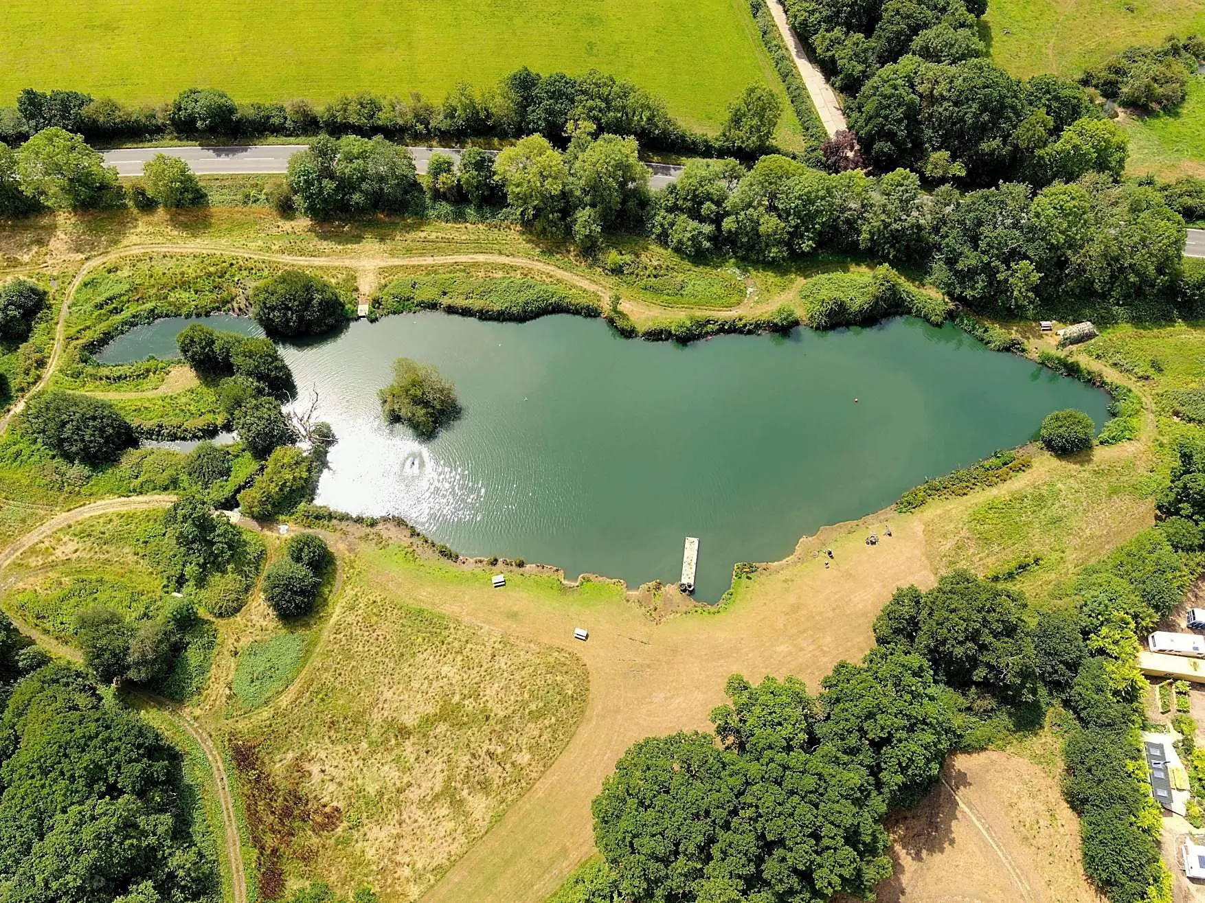 Aerial view of the lake and woodland